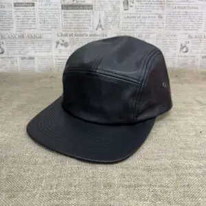 Black leather 5-panel camp cap.