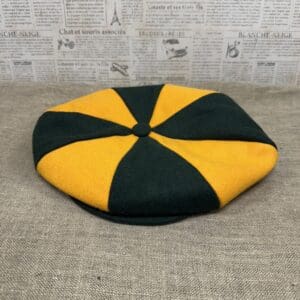 Gold and green eight-panel newsboy cap.